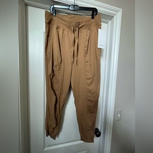 Brand new w/tags. LULULEMON Dance studio Joggers. Size 12.